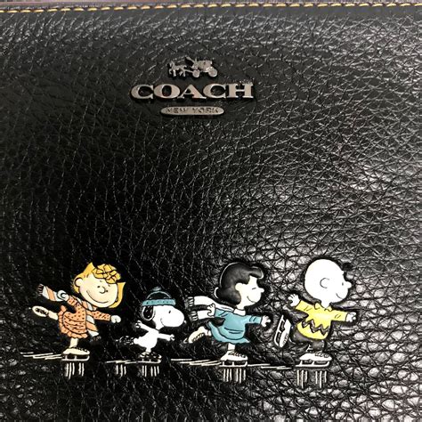 coach peanuts wristlet